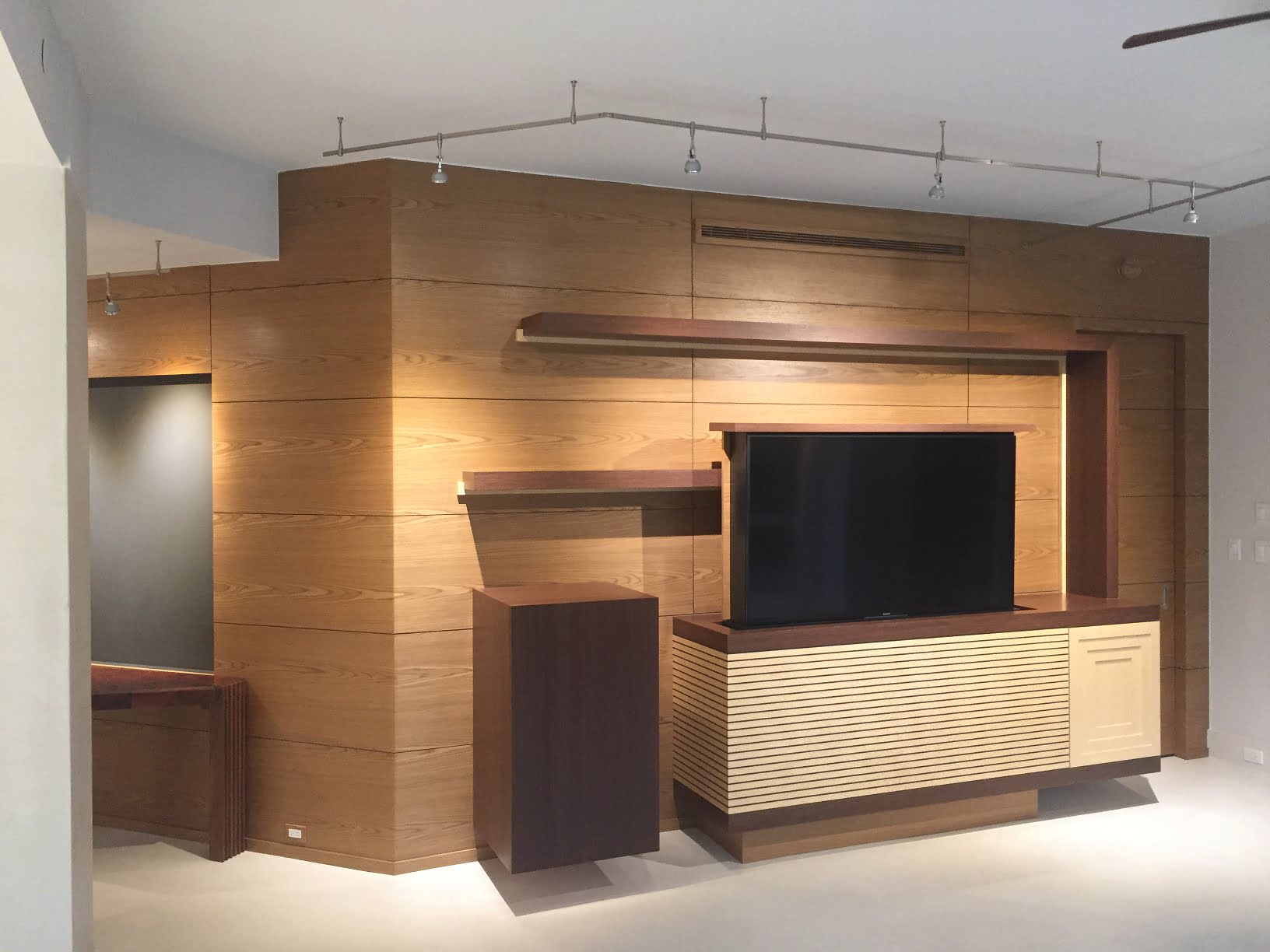 Modern Walnut and birds eye entertainment center pop up tv
